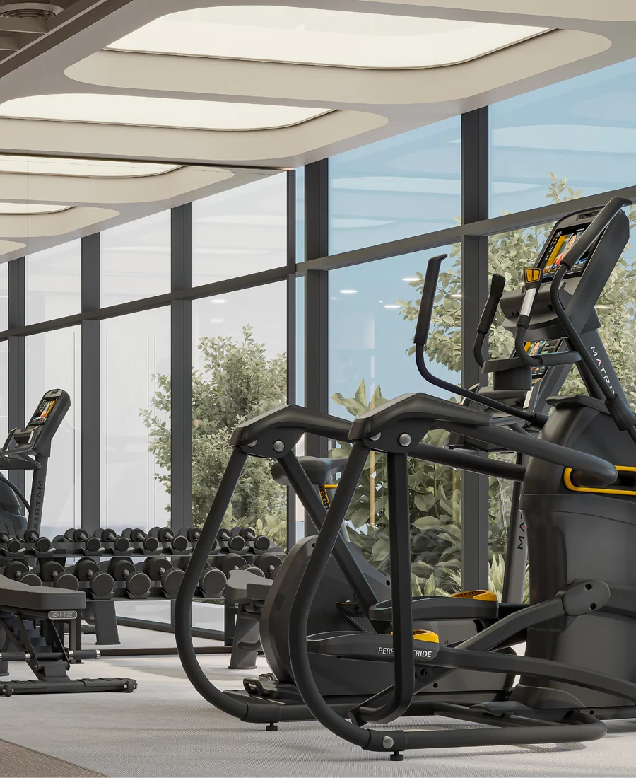 Gym with cardio equipment by panoramic windows